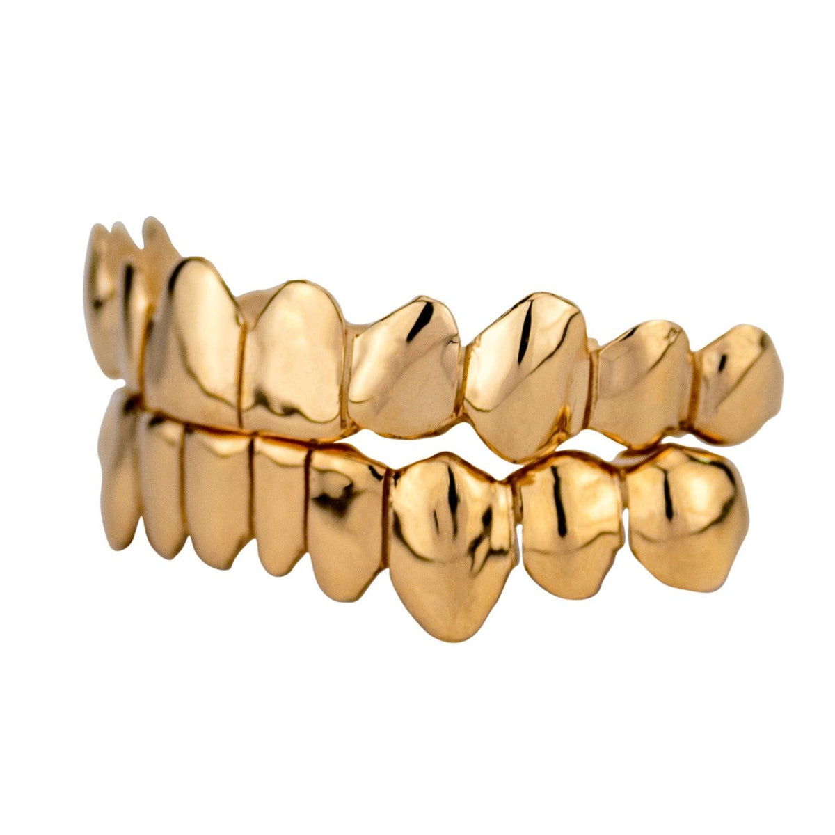 Angled view of polished yellow-gold upper and lower grillz